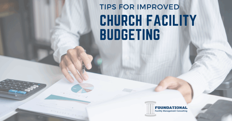 man looking at printed pie graph and using a calculator