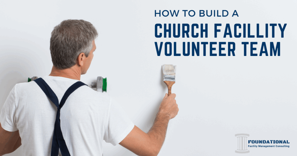 man on a ladder facing the wall and holding a paint brush