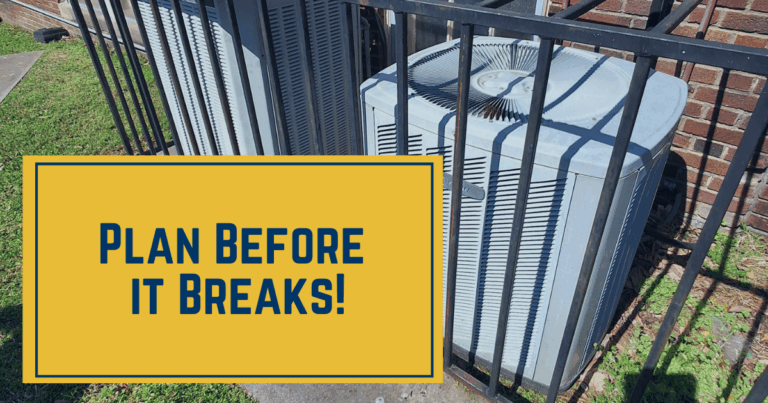 air condenser outside of a brick building